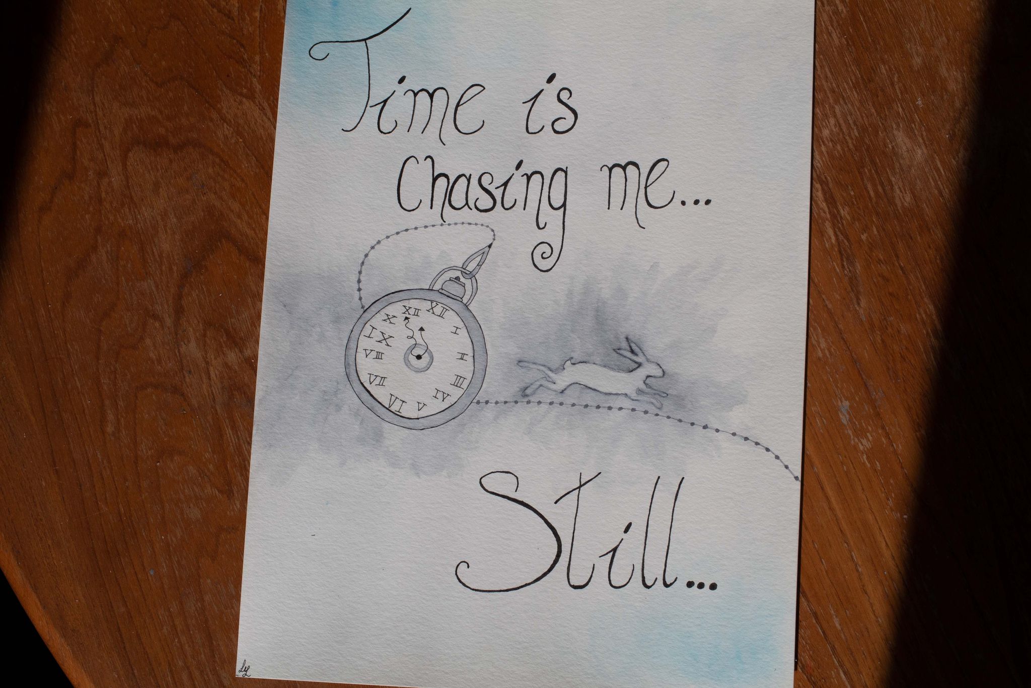 Product image of blue and white watercolour painting with white rabbit, pocket watch and text "Time is chasing me... Still"